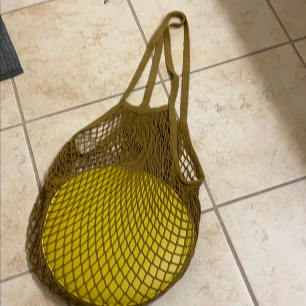 Mustard yellow street level hobo style bag